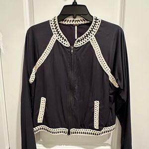 Free People crochet bomber jacket in charcoal with cream crochet trim